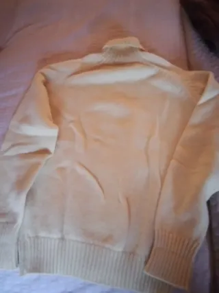 Jersey cuello alto tejido beige