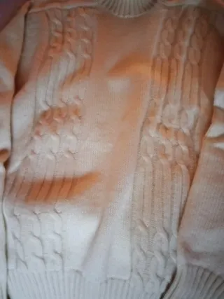 Jersey cuello alto tejido beige