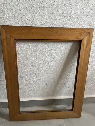 Marco de madera negro y dorado