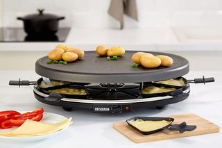 Parrilla Raclette x8: carne,verduras,queso fundido