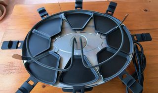 Parrilla Raclette x8: carne,verduras,queso fundido