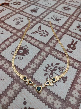 Collana bigiotteria oro e nero