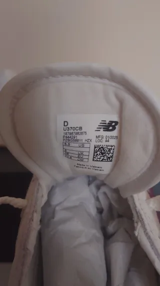 Deportivas New Balance Blancas y Moradas