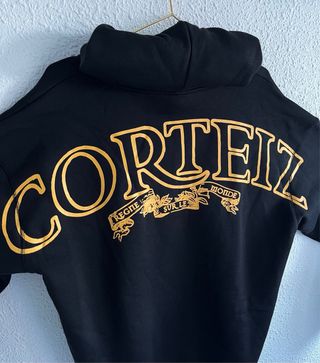 Sudadera Corteiz con cremallera y capucha