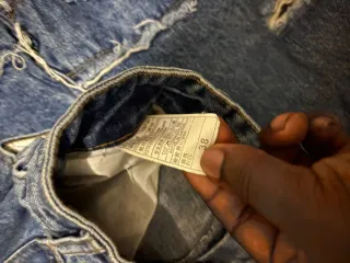 Jeans baggy strappati