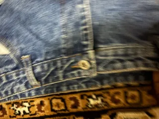 Jeans baggy strappati