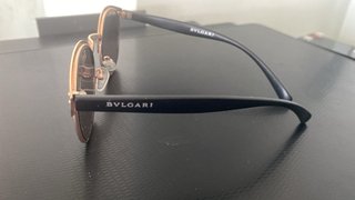 Gafas de sol  tipo Bvlgari doradas y verdes