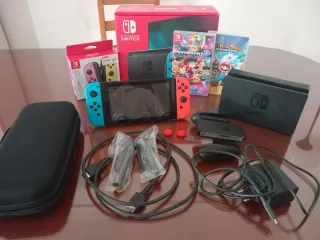 Nintendo Switch + 2 juegos + mandos + tarjeta sd