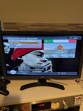 PlayStation 2 Fat SCPH-39004 + joystick + 2 Giochi