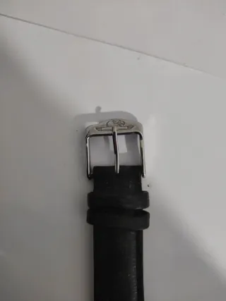 Dos relojes hombre, uno Swatch.