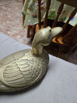 Figura bronce pato abre