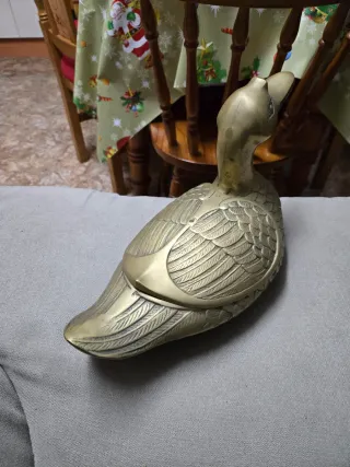 Figura bronce pato abre