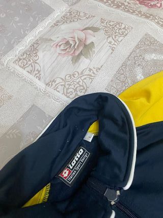 Tuta sportiva Lotto blu e gialla