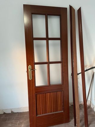 Puerta madera 3 ciegas + 1 cristalera
