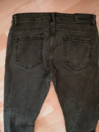 Vaqueros pitillo elásticos hombre negros