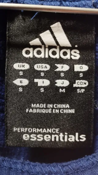 Pantalón Adidas azul con rayas