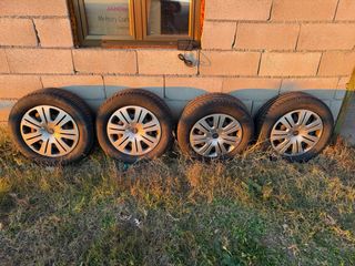 Ruedas completas Ford + medio uso