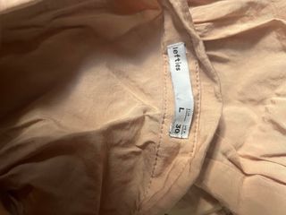 Vestido camisero rosa con volante