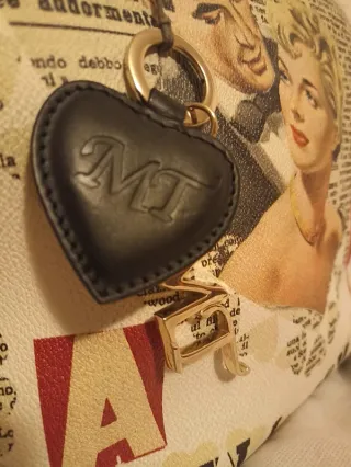 Borsa Marco Trulli pelle nera e oro