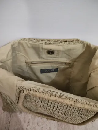 Bolso de mano beige tejido