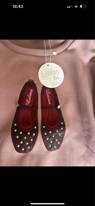 Jersey rosa con mangas de cuadros, precio 79 e