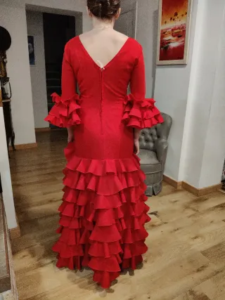Traje de flamenca rojo con volantes
