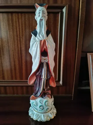 Figura porcelana chino dorada