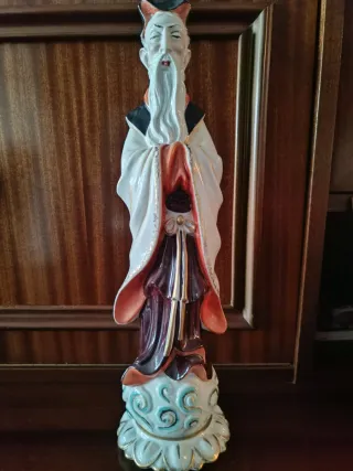 Figura porcelana chino dorada