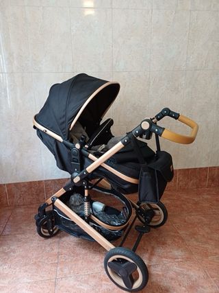 Carrito de bebé completo con la silla para coche