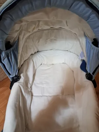 Cochecito bebé azul y blanco