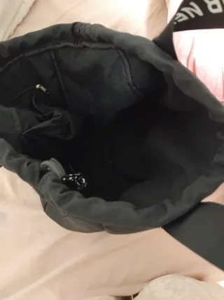 Bolso negro con frase Do It Now