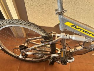 Bicicleta de montaña America + Casco