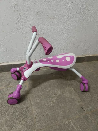 Triciclo infantil rosa y blanco
