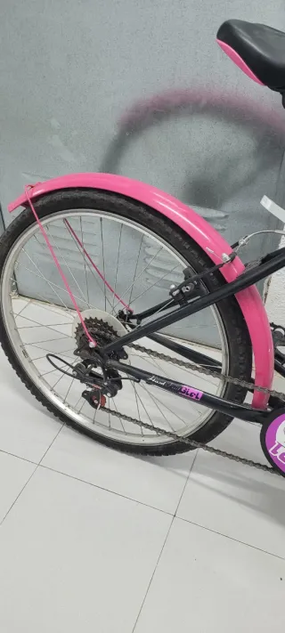 Bicicleta infantil rosa y negra