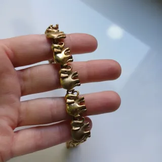 Pulsera bañada en oro con elefantes