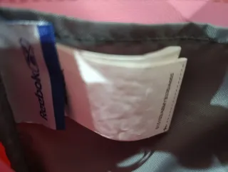 Bolso bandolera Reebok rosa