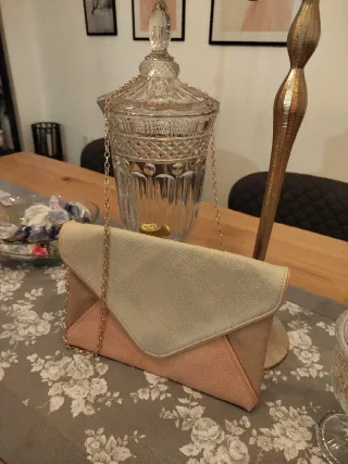 Bolso de mano beige y rosa