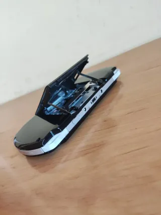 Sony PSP + cargador y funda