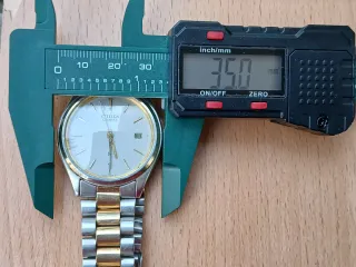 Reloj Citizen Cuarzo Dorado y Plateado