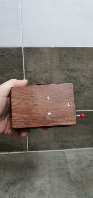 Caja de música de madera con elefante de la suerte