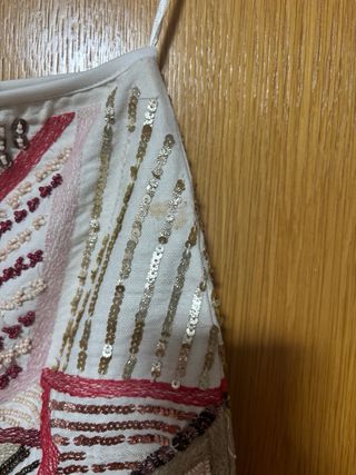 Falda con pedrería y lentejuelas