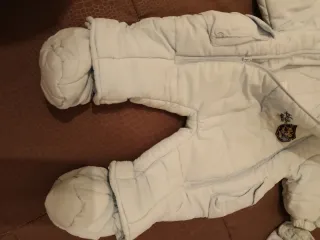 Tutina neonato imbottita azzurra