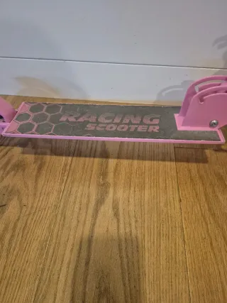 Patinete infantil rosa con diseño de unicornio