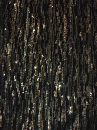 Top lentejuelas negro y dorado. Mossimo