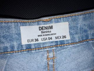 Vaqueros cortos desgastados claros