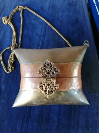 Pochette in rame e metallo
