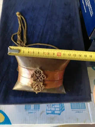 Pochette in rame e metallo