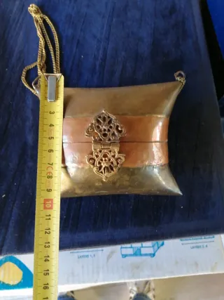 Pochette in rame e metallo