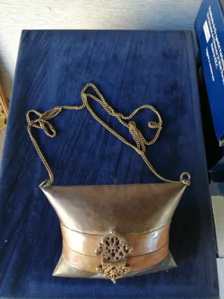 Pochette in rame e metallo