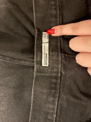 Shorts vaqueros negros con estrella desgarrada